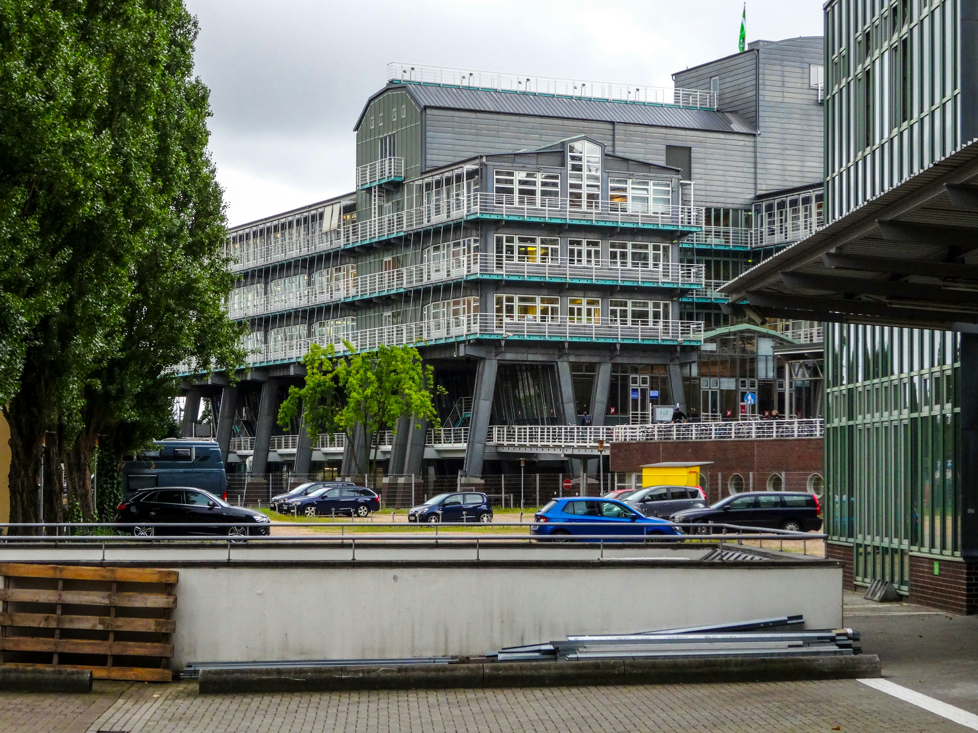 Modern office building with cars on street